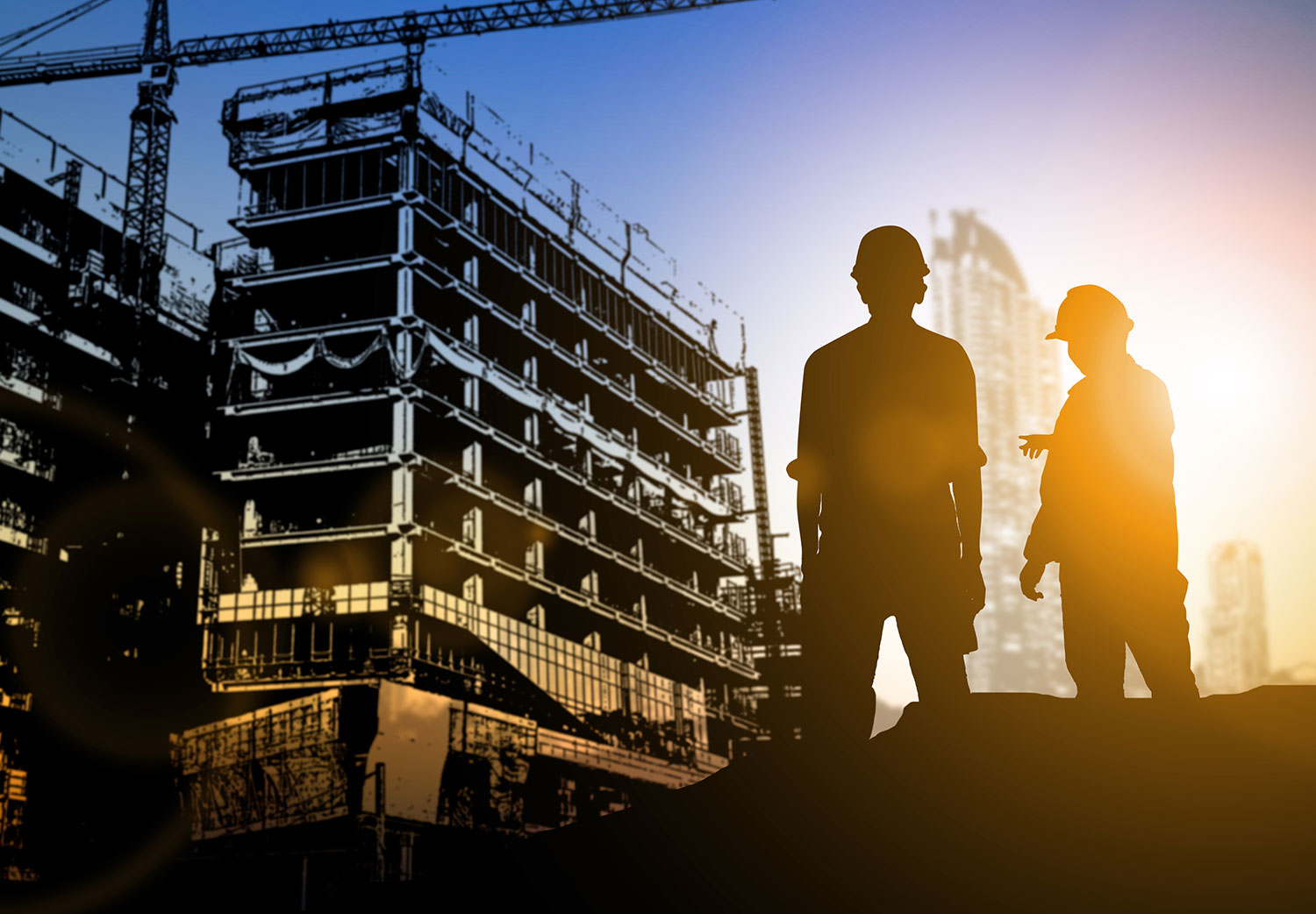 Businessman and engineer at a building construction site