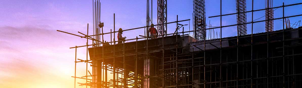 Workers on a building construction site