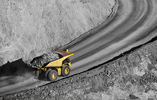 Truck transporting gold ore at a modern gold mine