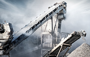 Industrial background with working gravel crusher